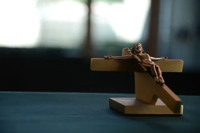 brown wooden cross on a table