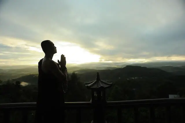 monk praying outdoor