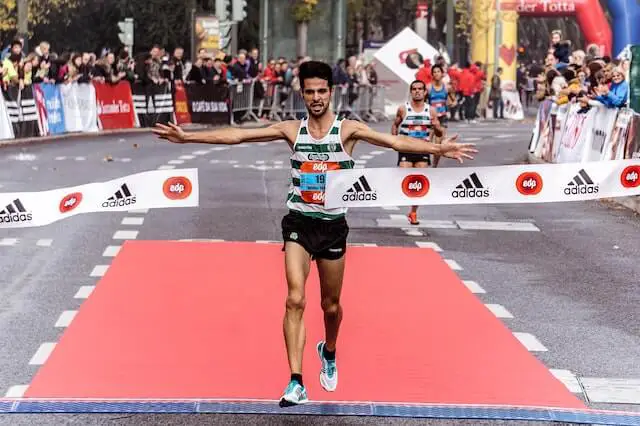 man finishing marathon run