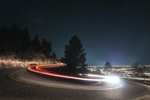 timelapse photo on a curved road